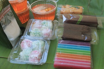 Various kinds of Indonesian food on banana leaves
