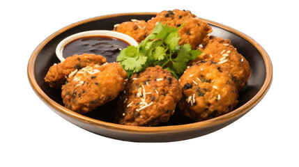 A plate of deep-fried breaded ball appetizers with sesame seeds and cilantro garnish, served with a dipping sauce.