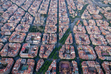 Aerial wide angle view of Barcelona Eixample residencial district with typical urban grid, Spain