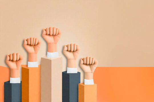 Peoples raised fist air fighting.teamwork concept