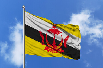 Brunei flag fluttering in the wind on sky.