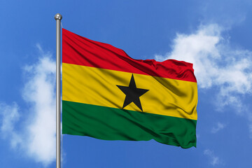 Ghana flag fluttering in the wind on sky.