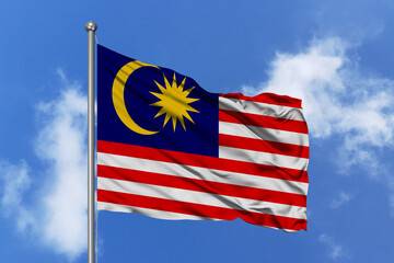 Malaysia flag fluttering in the wind on sky.