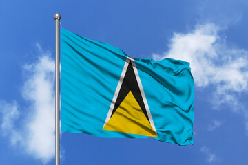 Saint Lucia flag fluttering in the wind on sky.