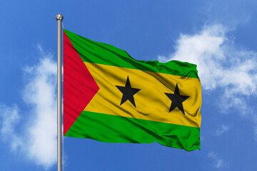 Sao tome and Principe flag fluttering in the wind on sky.