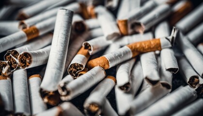  A collection of used cigarettes, a symbol of addiction and waste - obrazy, fototapety, plakaty