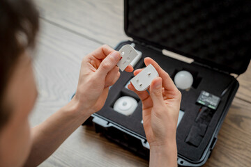 A technician works with a demo kit of the smart home system