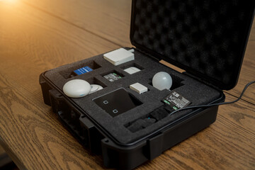 A technician works with a demo kit of the smart home system