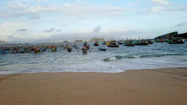 Hundreds of fishing boats at the Papuma Beach, a white-sand beach in East Java, Indonesia