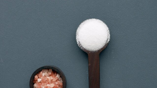 comparing Raw dried pink Himalayan salt with white salt 