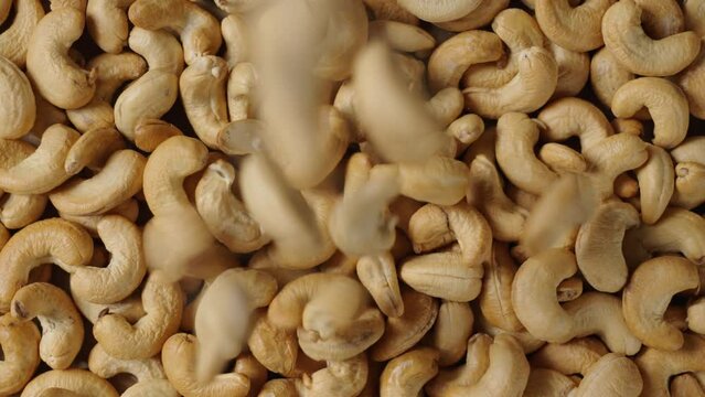 roasted salted cashew nuts background.