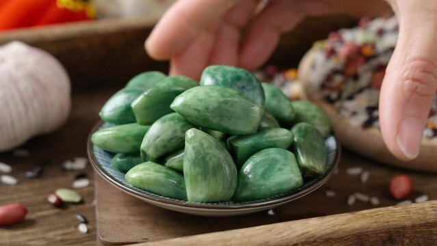 traditional Chinese food Laba garlic pickled garlic on table.