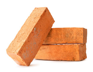 Cracked old red or orange bricks in stack isolated on white background with clipping path