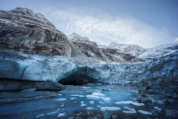Winter landscape view of a glacier ice cave entrance