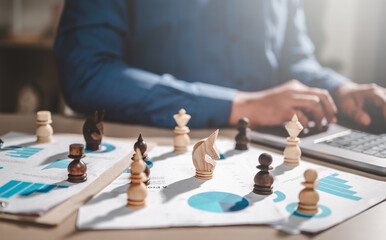 business, management, planning, strategy, chart, plan, leader, manager, chess, professional. businessman put on casual suit in front of chess piece on document with chart progress to hit the goal.