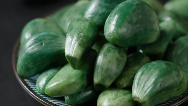 traditional Chinese food Laba garlic pickled garlic on black background.