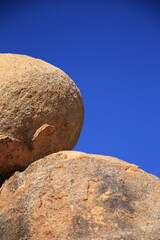 giant granite pebbles in blue sky Erongo mountains