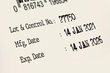 Fotobehang DOF of Expiry date and manufacturing date. © Peachayatanomsup