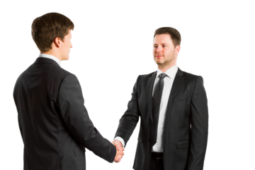 Two businessmen in suits shaking hands, isolated on a white background. Partnership concept