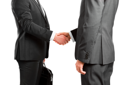 Businessmen in formal suits shaking hands, making a deal, isolated on white background