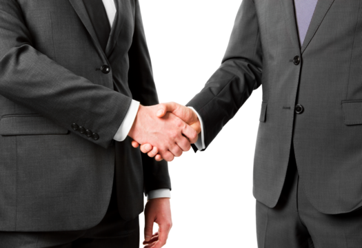 Close up of a firm handshake between businessmen, agreement concept, isolated on white