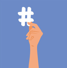 Hand Holding a Hashtag Sign Vector Cartoon illustration. Blogger influencer making a trendy post on social media 

