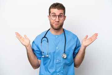 Young surgeon doctor caucasian man isolated on white background having doubts while raising hands