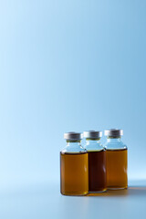 syringe for injectable medication on blue background