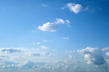 Obraz premium Blue sky background with white clouds. Cumulus white clouds in the blue sky.