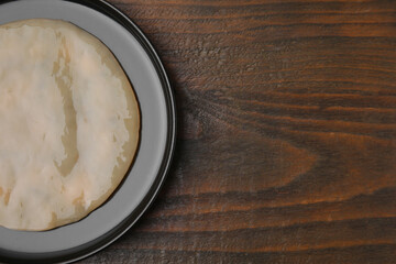 Making kombucha. Scoby fungus on wooden table, top view. Space for text