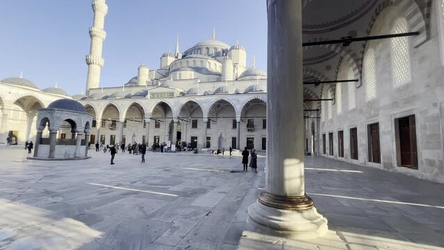 blue mosque exterior main dome and minarets from courtyard view 