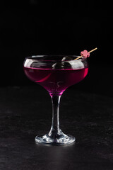 Alcoholic cocktail on black background