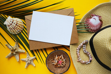 summer holiday concept. straw hat, palm branch and seashells. white blank
