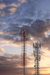 Communication tower top. Radio antenna Tower , microwave antenna tower on light sky background....