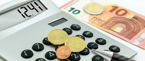 12,41 Euro German minimum wage and calculator on white background