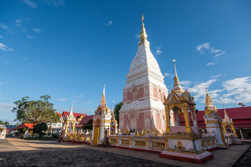 White pagoda located in a temple, Thailand, bright sunlight