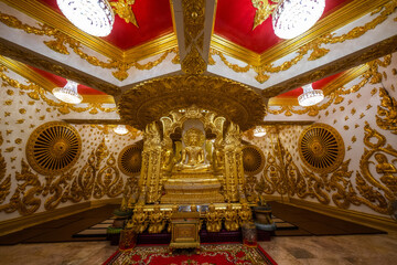 Golden Buddha statue located in a Thailand temple