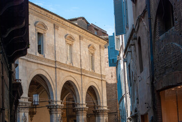 the wonderful buildings of the small Siena, a beautiful Tuscan town - obrazy, fototapety, plakaty