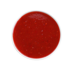 Spicy chili sauce in bowl isolated on white, top view