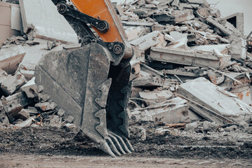 construction equipment destroys affected houses war in Ukraine