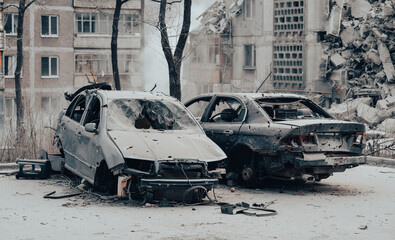 damaged and looted cars in a city in Ukraine during the war