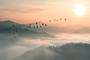 Obraz premium flock of birds flying over the mountains