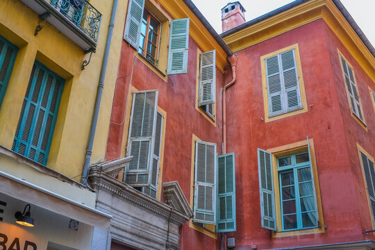 Nice, France, 02/13/2024: The architecture of the old town in Nice boasts a blend of Italian style with French motifs, characterized by colorful houses and narrow streets.