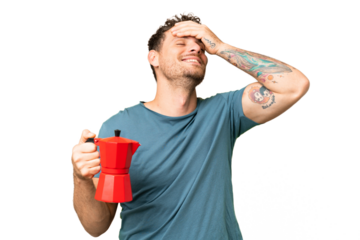 Brazilian man holding coffee pot over isolated chroma key background has realized something and intending the solution