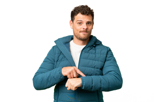 Brazilian man over isolated chroma key background making the gesture of being late