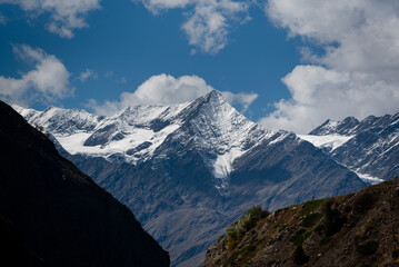 Snow mountain peak of Himalaya with scenic sky