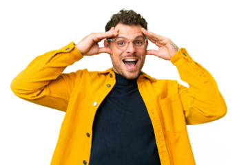 Brazilian man over isolated chroma key background with surprise expression