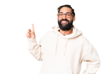Young man with beard over isolated chroma key background showing and lifting a finger in sign of the best
