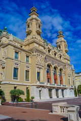 Fototapeta na wymiar Principality of Monaco, Monaco, 13.2.2024: The magnificent facade of the Opéra de Monte-Carlo next to the famous casino