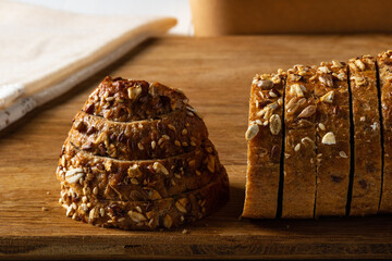 Pieces of whole grain bread on the table. Low-carb diet.